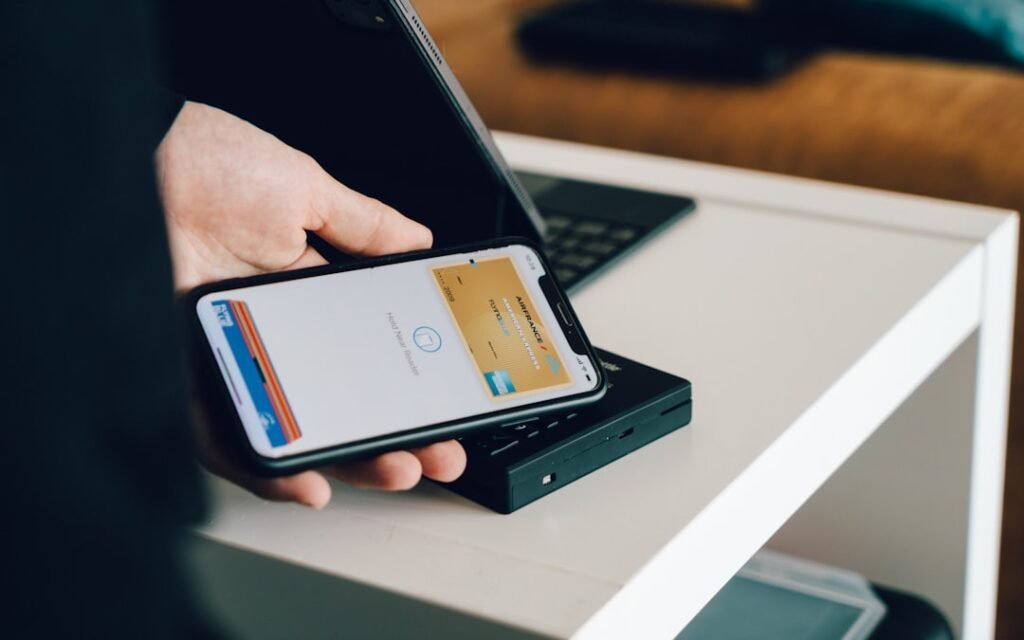iPhone being used for an Apple Pay contactless payment