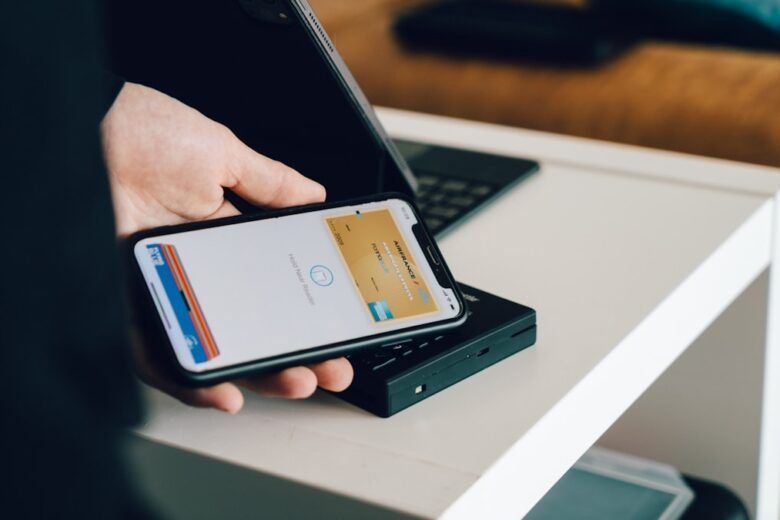 iPhone being used for an Apple Pay contactless payment
