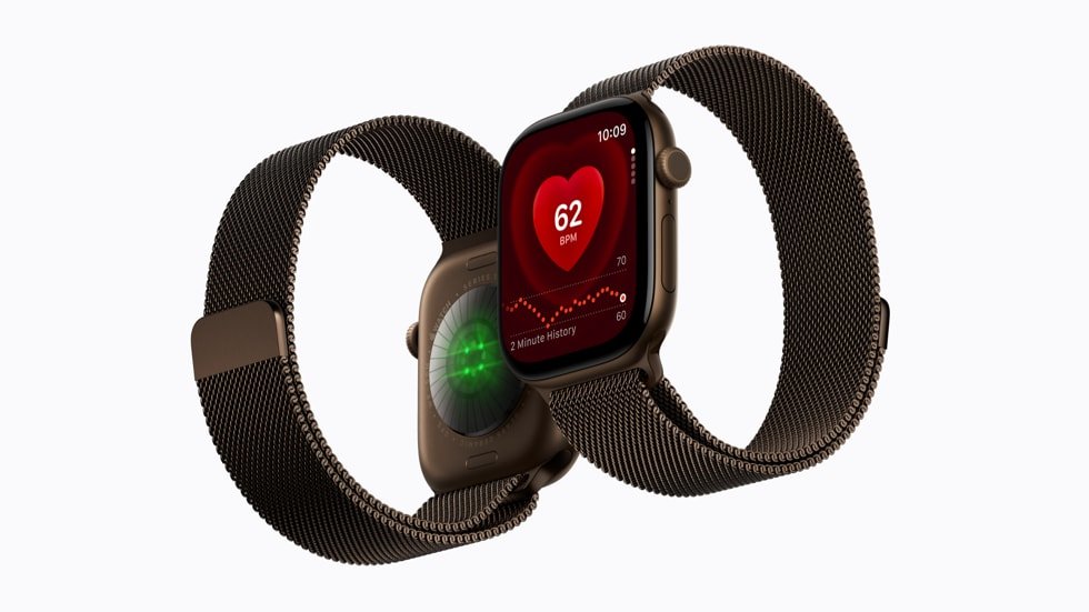 Two Apple Watch Series 12 devices showing the rear sensors and Heart Rate app