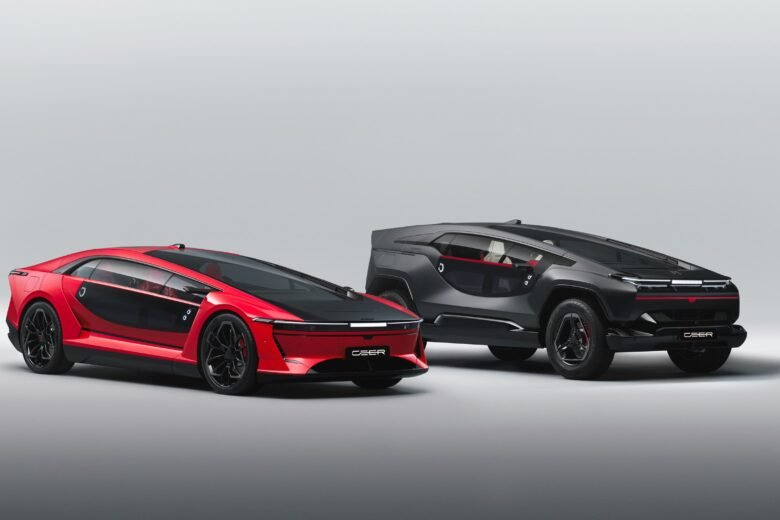 Red Ceer EXOBOT electric sedan beside a dark gray EXOBOT electric SUV in a studio