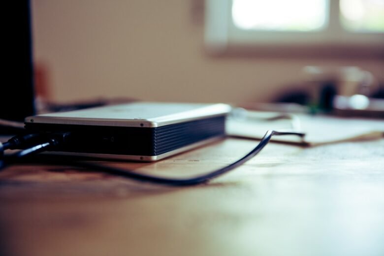 Hard disk drive illustrating external drive and cloud backup comparison