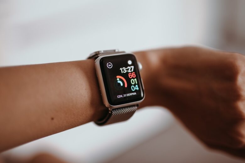 Fitness smartwatch displaying activity information used to interpret tracker numbers