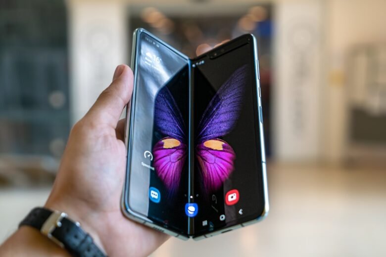 Foldable smartphone opened on a table, illustrating foldable phone technology