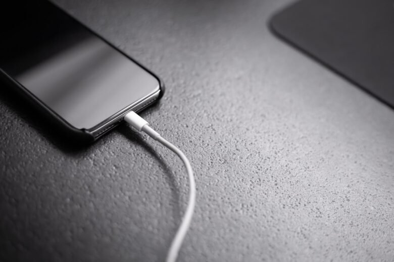 Phone connected to a charging cable
