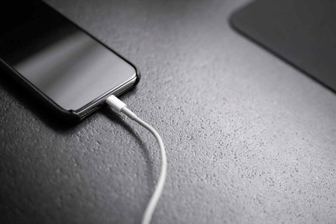 Phone connected to a charging cable