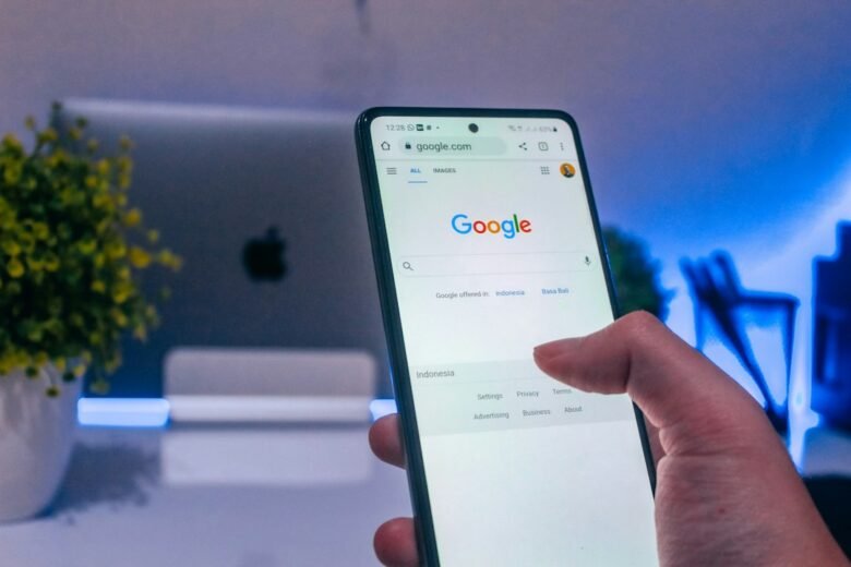 Smartphone representing Google Gemini real-time AI audio conversations