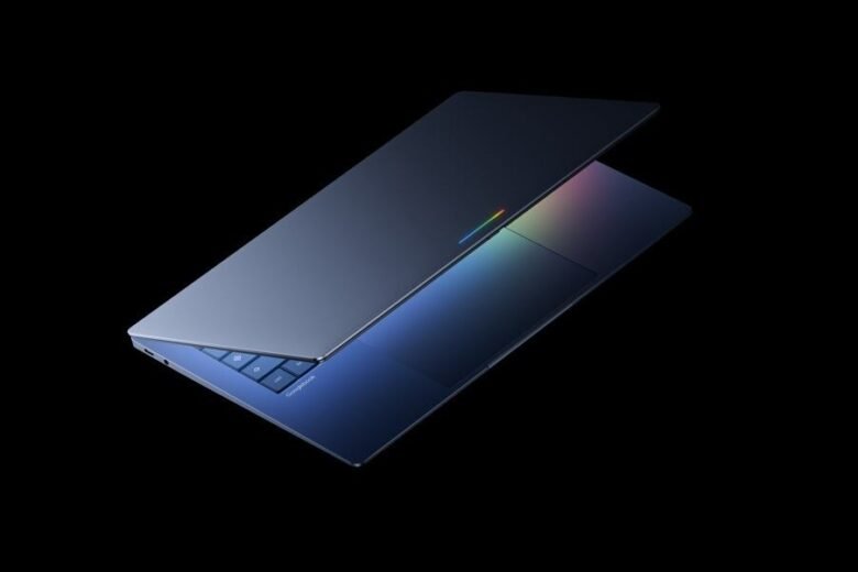 Open Googlebook laptop with blue chassis, centered trackpad and colorful Glowbar
