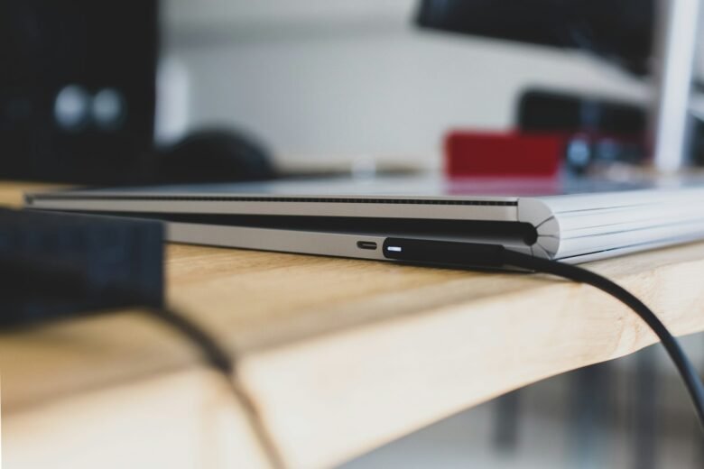 Microsoft Surface laptop and tablet arranged on a desk