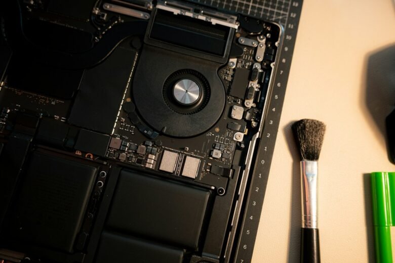 Open laptop showing internal components for upgrade and repair decisions