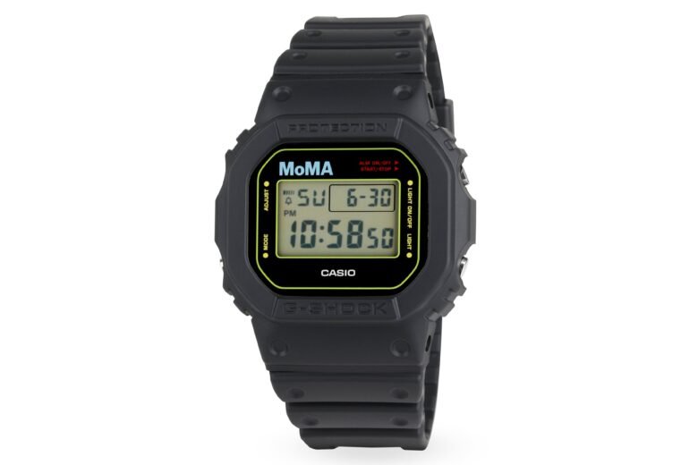 Black MoMA Casio G-Shock with a digital display, cyan MoMA logo and chartreuse face border