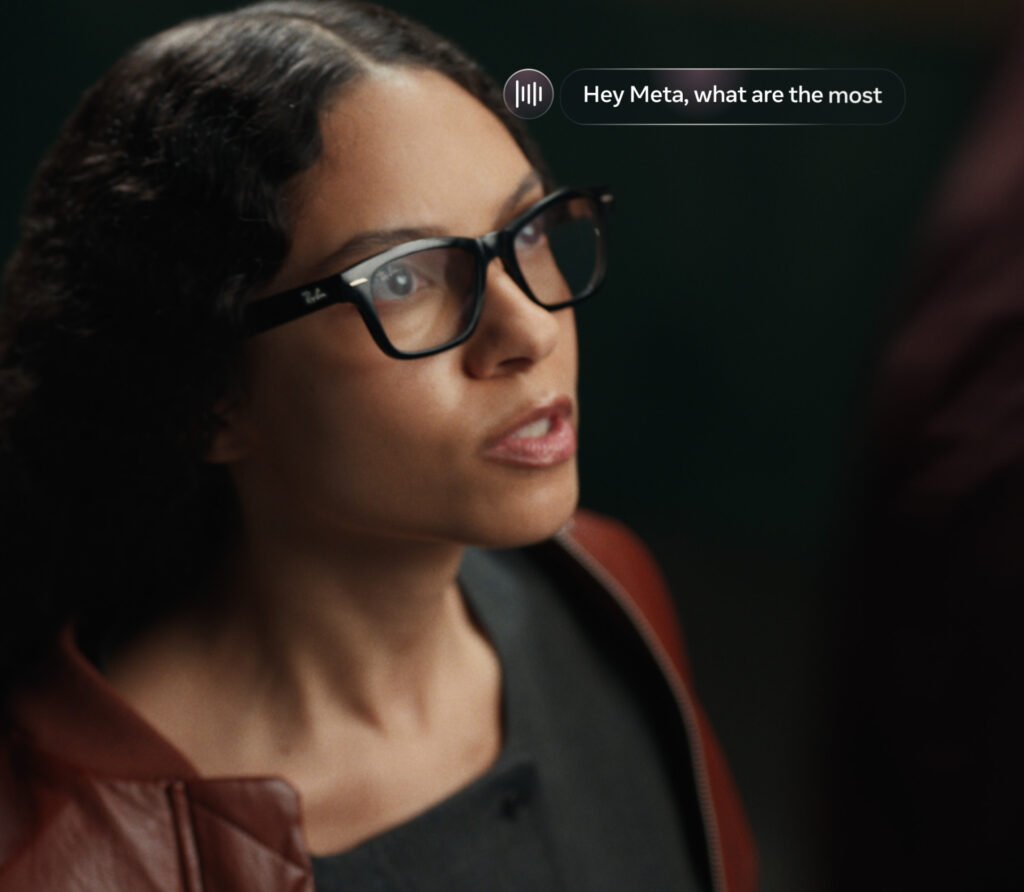 Woman wearing black Ray-Ban Meta Audio glasses while using the Meta AI assistant