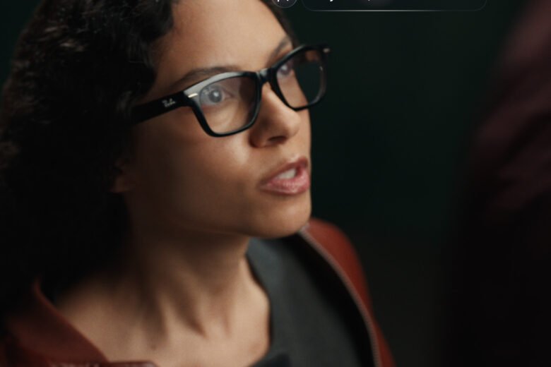 Woman wearing black Ray-Ban Meta Audio glasses while using the Meta AI assistant