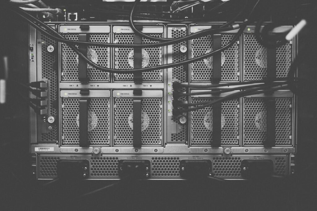 Data center server hardware representing high-capacity DDR5 memory. Photo by Kvistholt Photography on Unsplash.