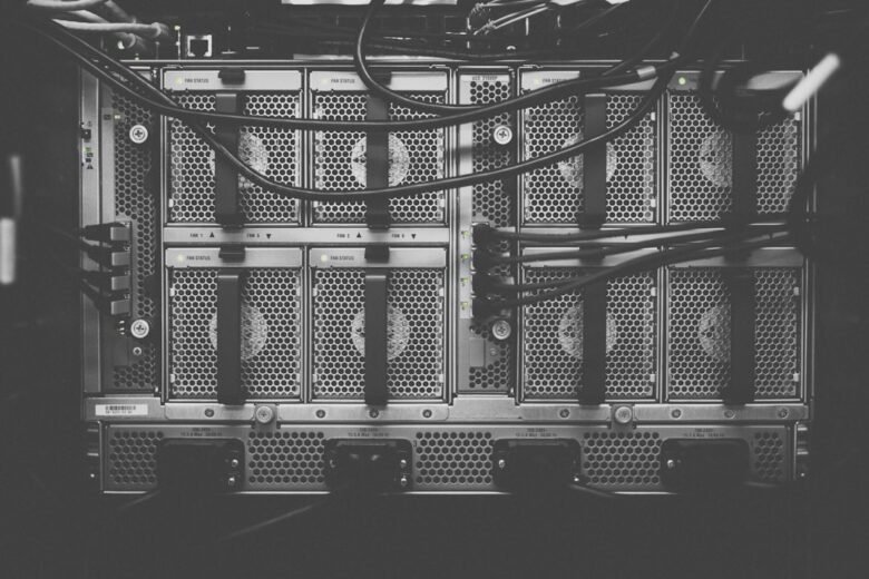 Data center server hardware representing high-capacity DDR5 memory. Photo by Kvistholt Photography on Unsplash.