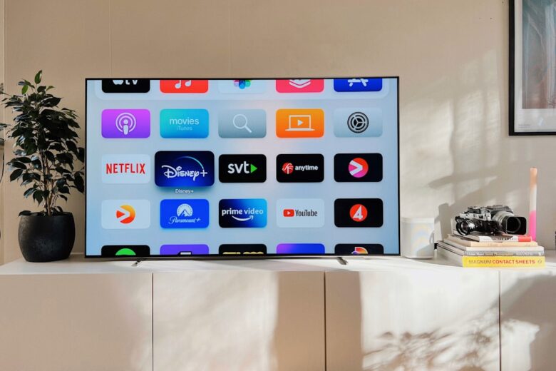 Smart television in a living room representing built-in streaming apps