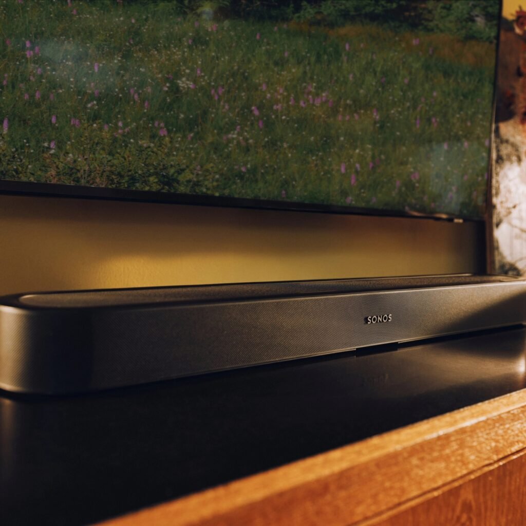 Black Sonos Beam Ultra soundbar positioned beneath a television; image: Sonos