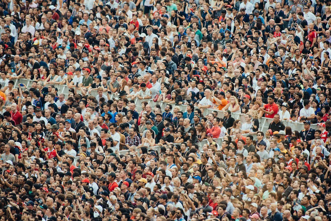 Crowd watching an event from stadium seating