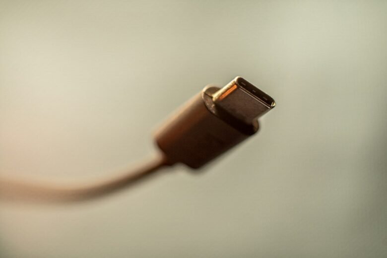Close-up of a USB-C cable connector on a light background