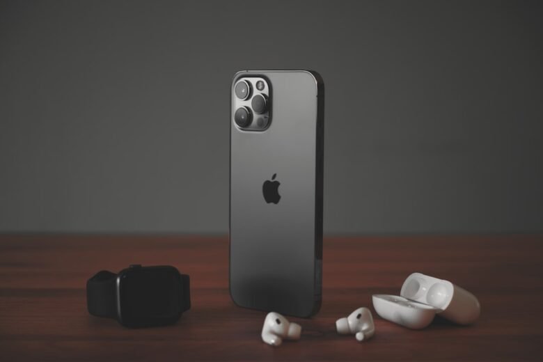 Apple smartphone and accessories illustrating iPhone upgrade advice