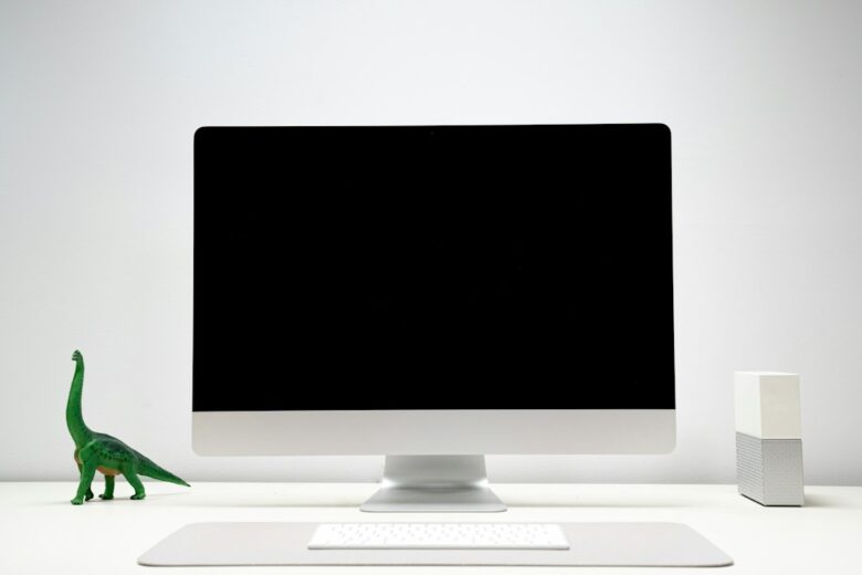 All-in-one desktop computer on a desk (illustrative)