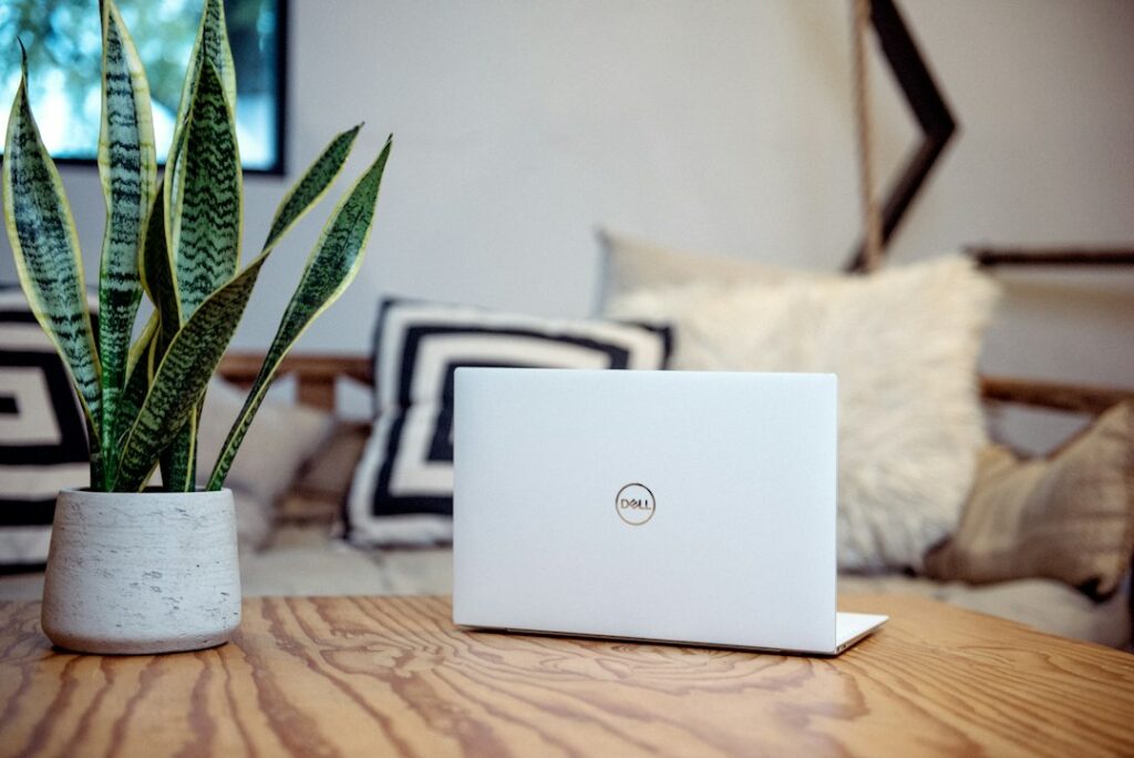Laptop on a wooden table