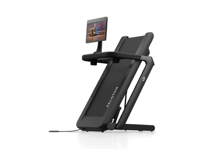 Peloton Tread Flex treadmill folded upright in its space-saving storage position