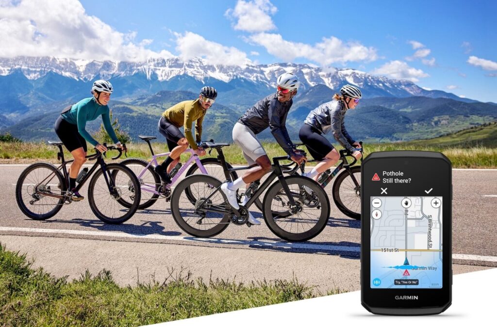 Garmin Edge 1060 cycling computer displaying ride data and a hands-free voice command prompt