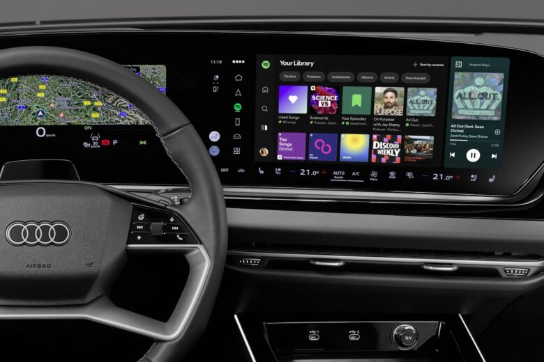 Spotify native in-car app displayed across an Audi MMI dashboard